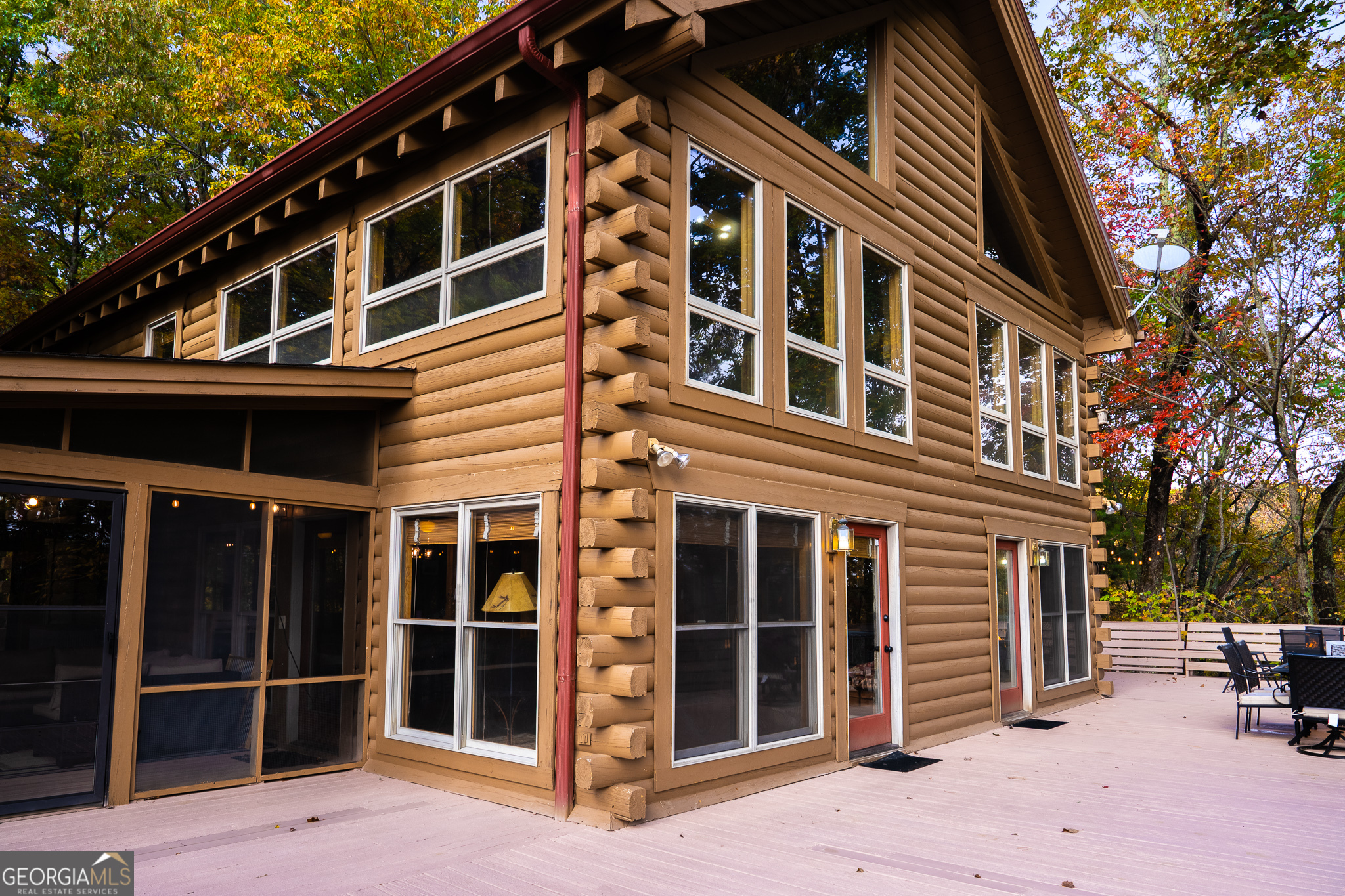 1427 Cherry Lake Drive Blue Ridge, GA 30513 - Photo 73 of 89 a front view of a building with a glass door