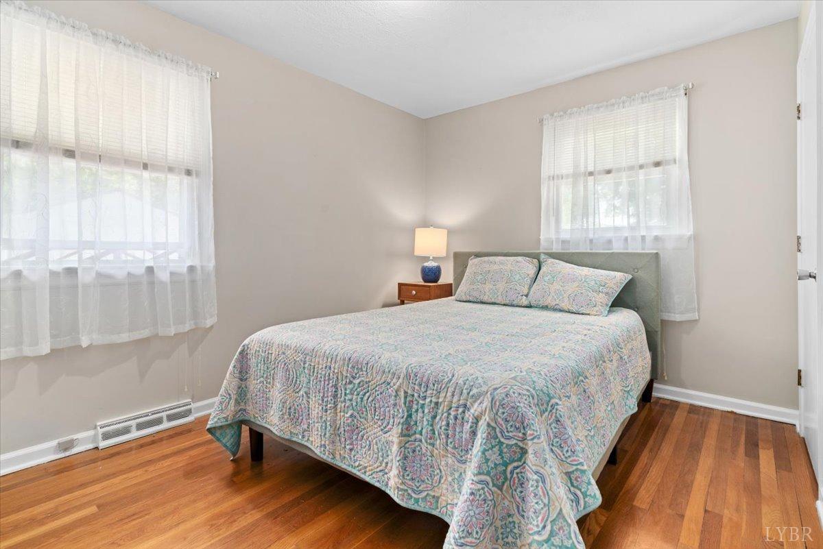 1752 Purdum Mill Road Appomattox, VA 24522 - Photo 20 of 38 a bedroom with a bed and a window
