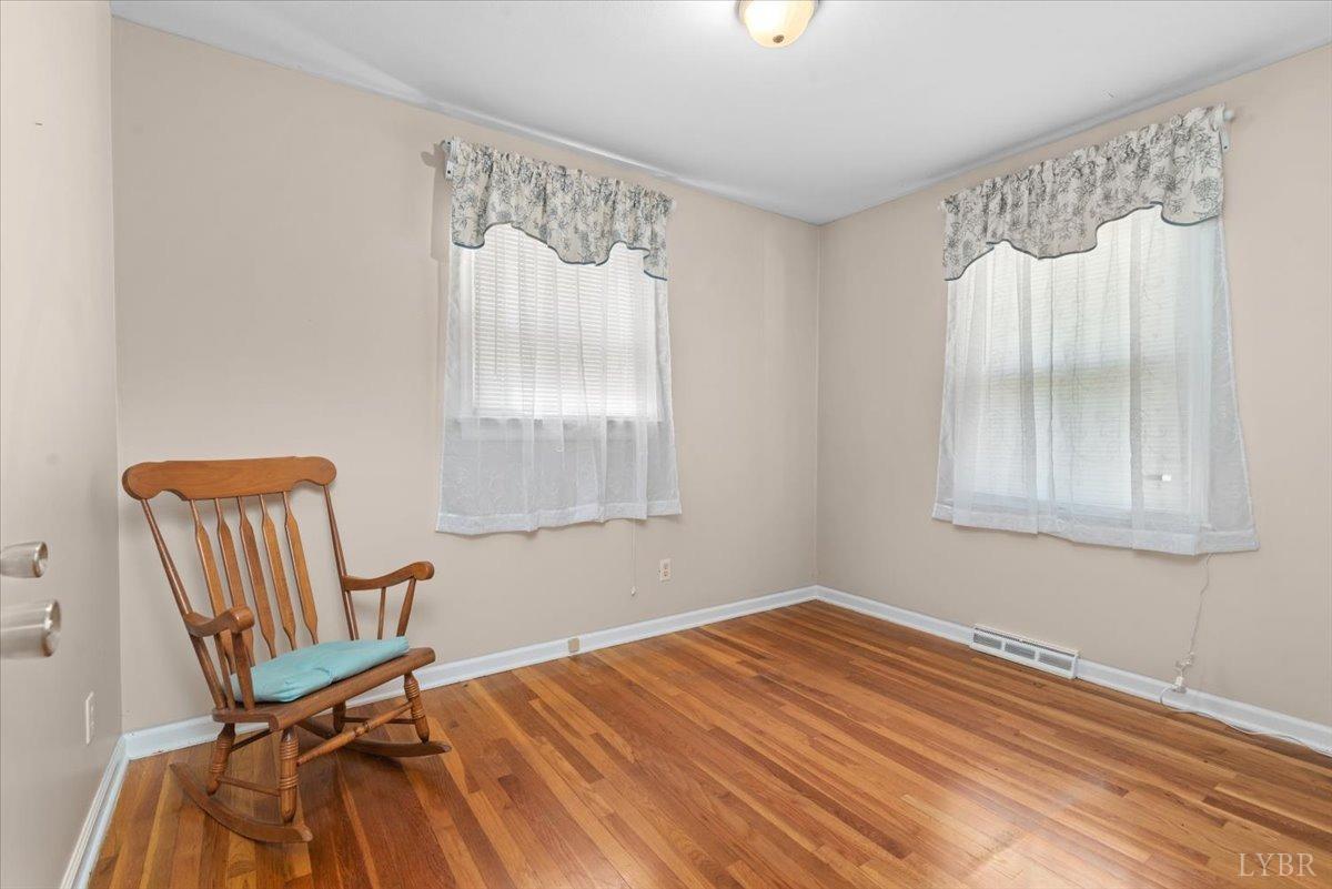 1752 Purdum Mill Road Appomattox, VA 24522 - Photo 22 of 38 a bedroom with a bed and a window