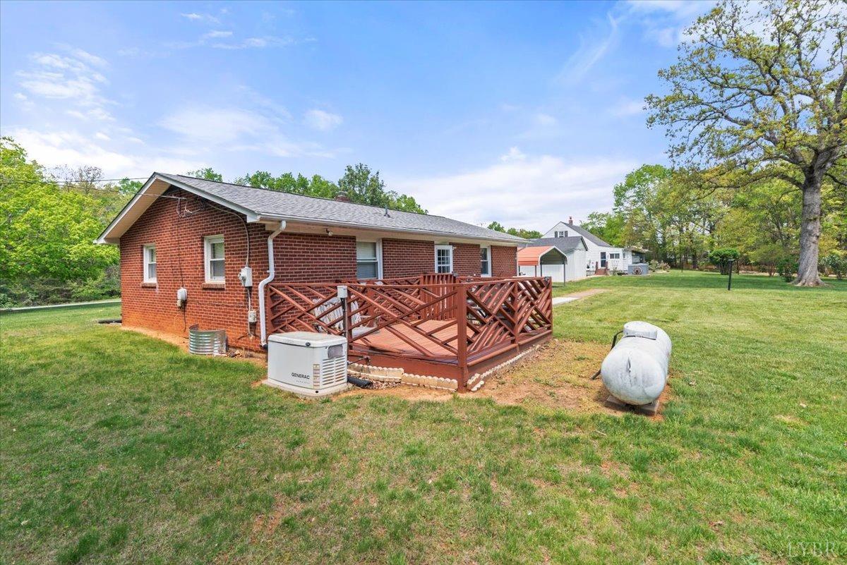 1752 Purdum Mill Road Appomattox, VA 24522 - Photo 3 of 38 a front view of a house with garden