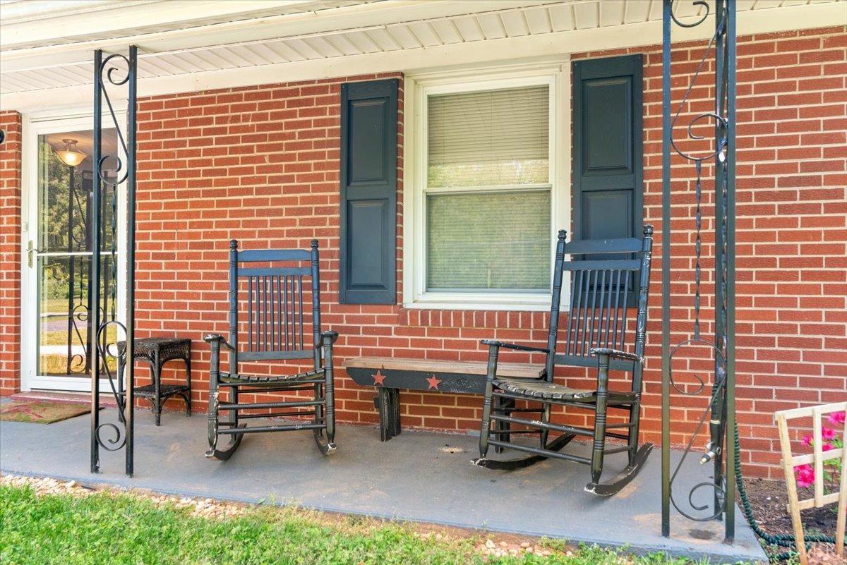 1752 Purdum Mill Road Appomattox, VA 24522 - Photo 4 of 38 a backyard of a house with outdoor seating