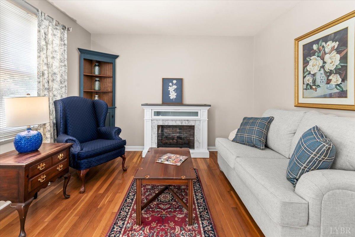 1752 Purdum Mill Road Appomattox, VA 24522 - Photo 6 of 38 a living room with furniture fireplace and window