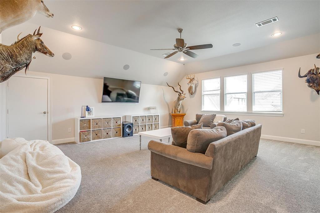 604 Rockfall Way Aledo, TX 76008 - Photo 19 of 33 a living room with furniture and a large window