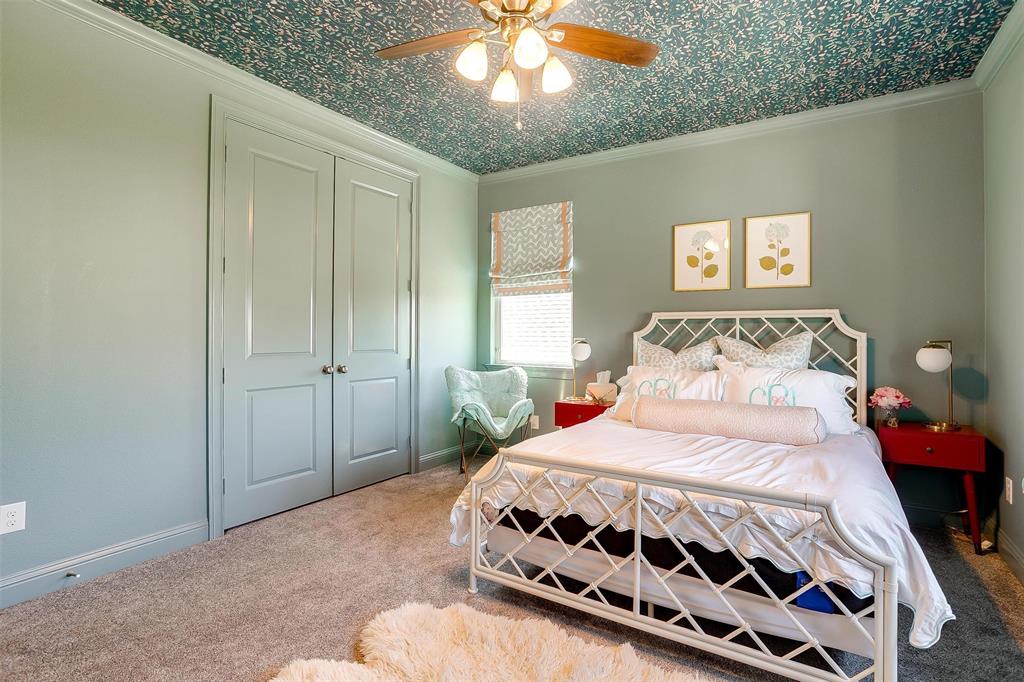604 Rockfall Way Aledo, TX 76008 - Photo 24 of 33 a bedroom with a bed and a window
