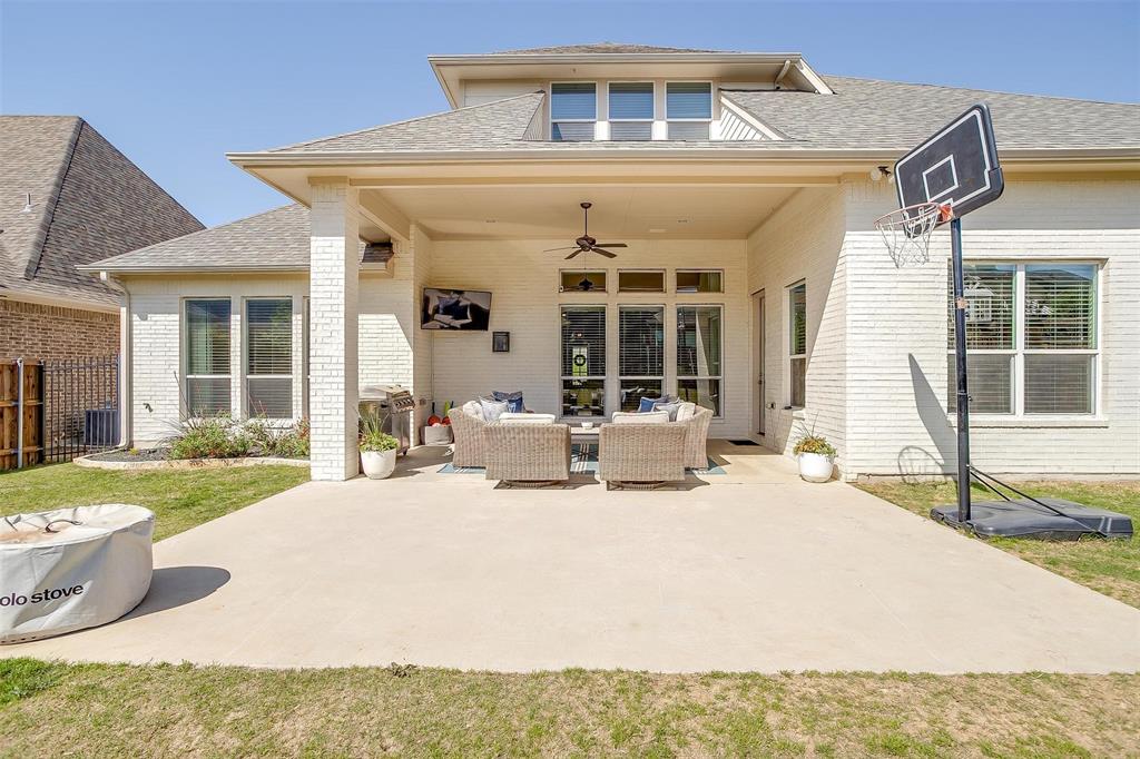 604 Rockfall Way Aledo, TX 76008 - Photo 27 of 33 a view of a house with backyard porch and sitting area