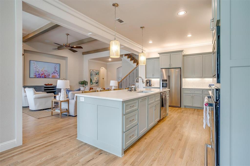 604 Rockfall Way Aledo, TX 76008 - Photo 9 of 33 a kitchen with stainless steel appliances lots of counter top space
