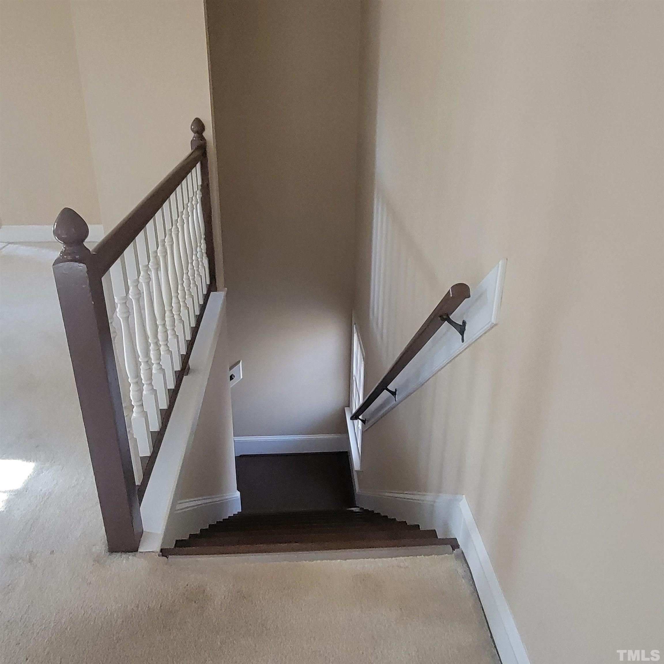 11817 Pembridge Lane Raleigh, NC 27613 - Photo 28 of 40 a view of an entryway with staircase