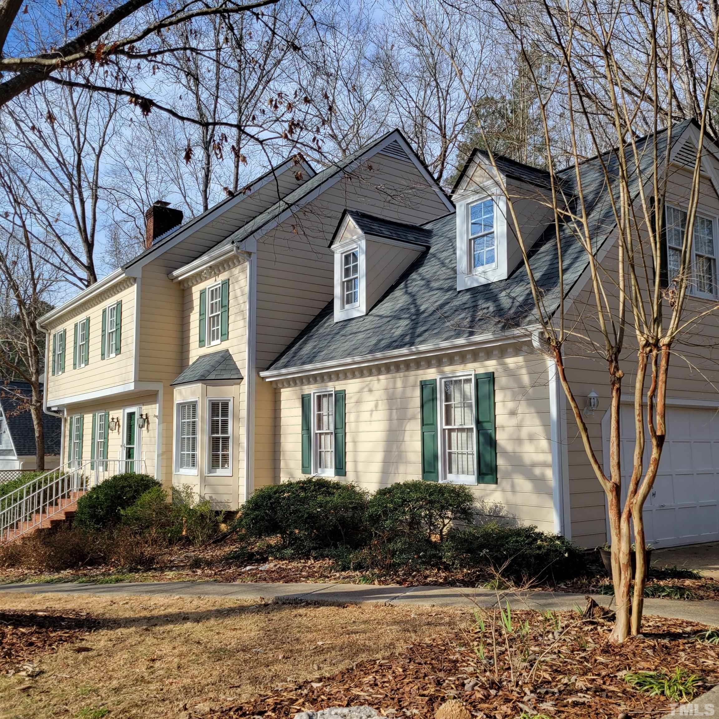 11817 Pembridge Lane Raleigh, NC 27613 - Photo 40 of 40 a front view of a house with a yard