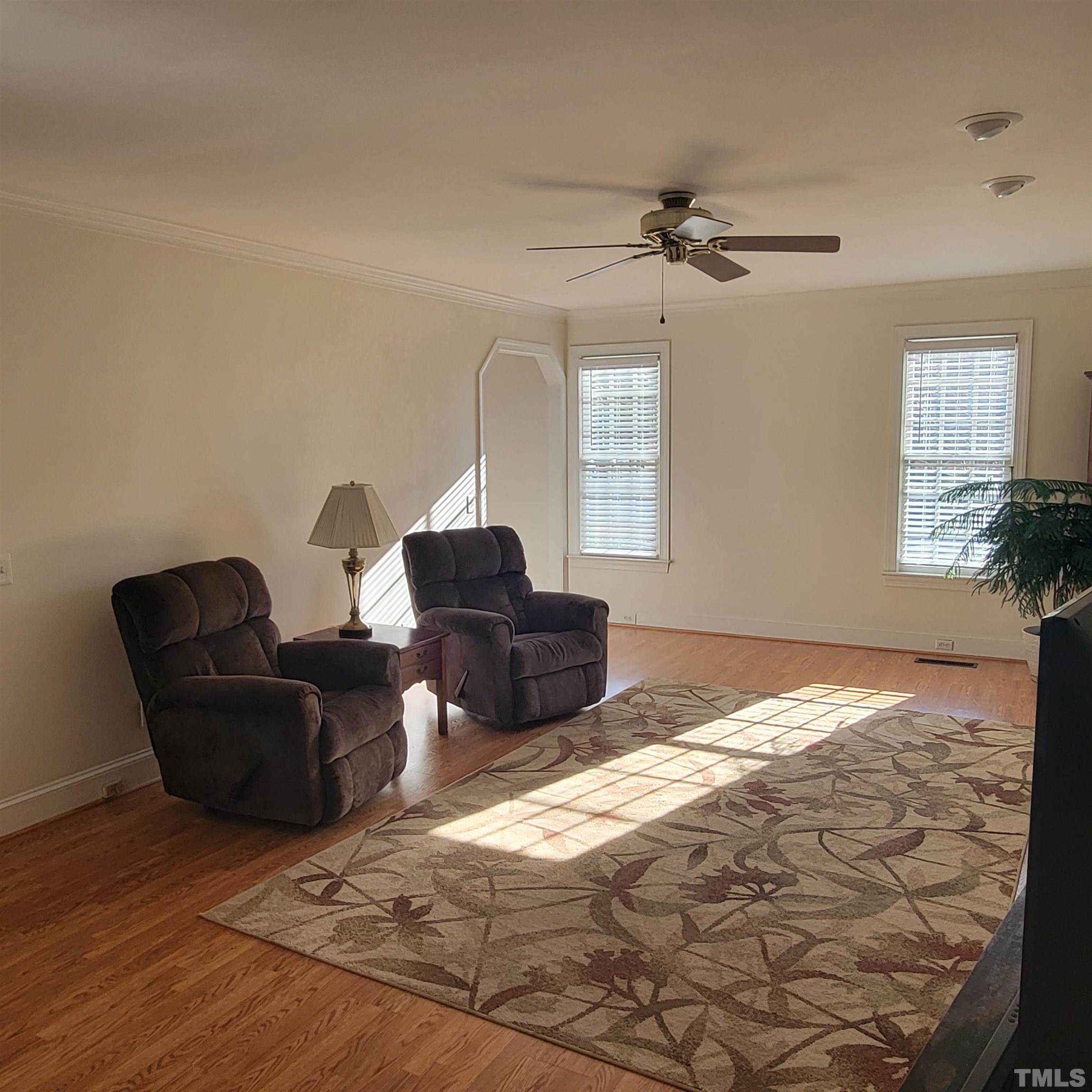11817 Pembridge Lane Raleigh, NC 27613 - Photo 10 of 40 a bed room with a bed and a couch