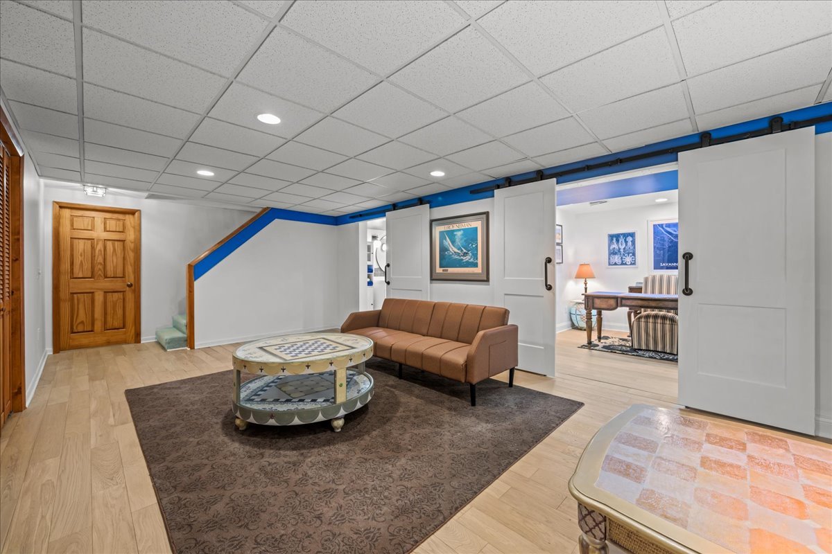 231 Sedgewick Circle St. Charles, IL 60174 - Photo 19 of 24 a living room with furniture and a wooden floor