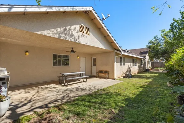 a house with trees in the background