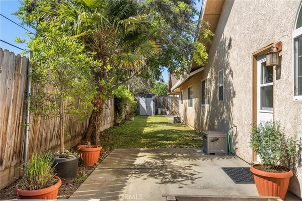 a view of a back yard of the house