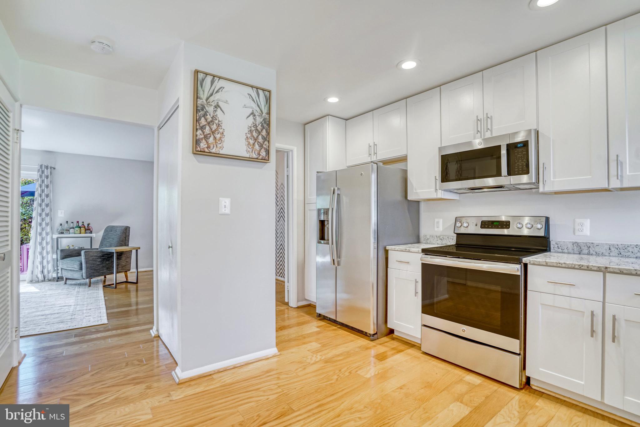 1713 Wainwright Drive Reston, VA 20190 - Photo 13 of 67 renovated Kitchen 2016 with shaker white cabinets