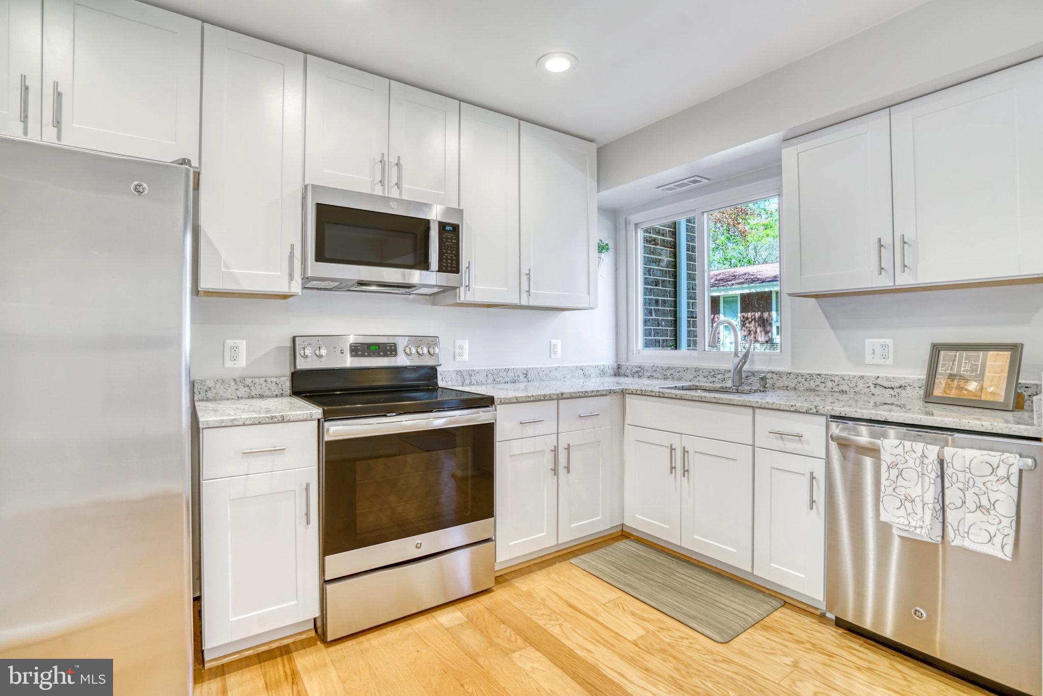 1713 Wainwright Drive Reston, VA 20190 - Photo 14 of 67 Stainless steel appliances and granite counters