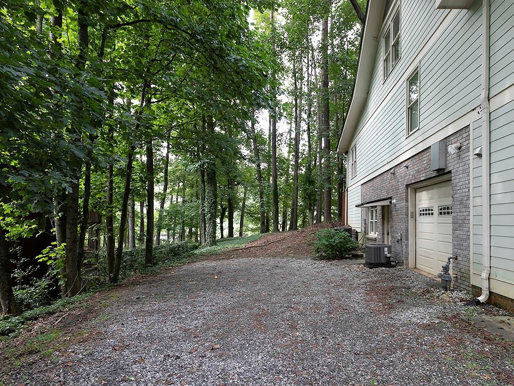 2270 Pilgrim Mill Way Cumming, GA 30041 - Photo 4 of 21 a view of a house with a tree in the background