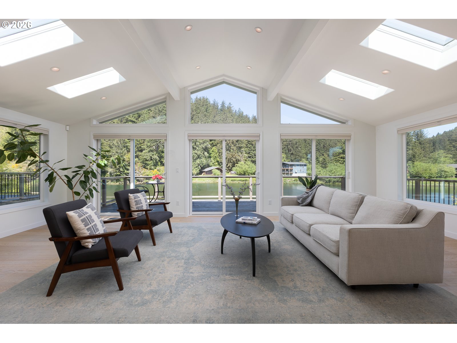 34098 Brooten Road Pacific City, OR 97135 - Photo 4 of 38 a living room with furniture and a large window