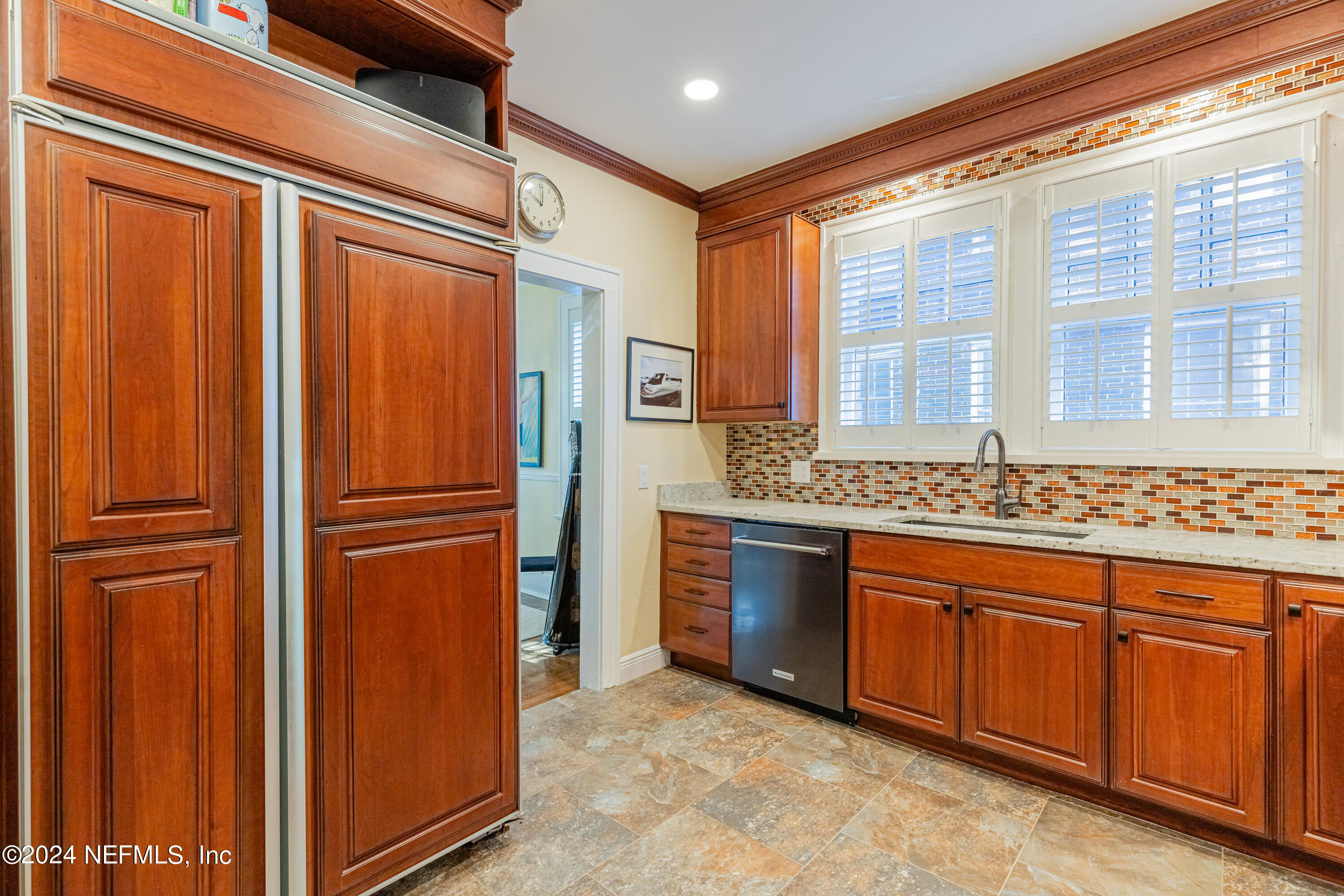 3665 Hedrick Street Jacksonville, FL 32205 - Photo 23 of 62 Hidden, wood paneled refrigerator