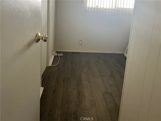 a bathroom with a shower and a toilet