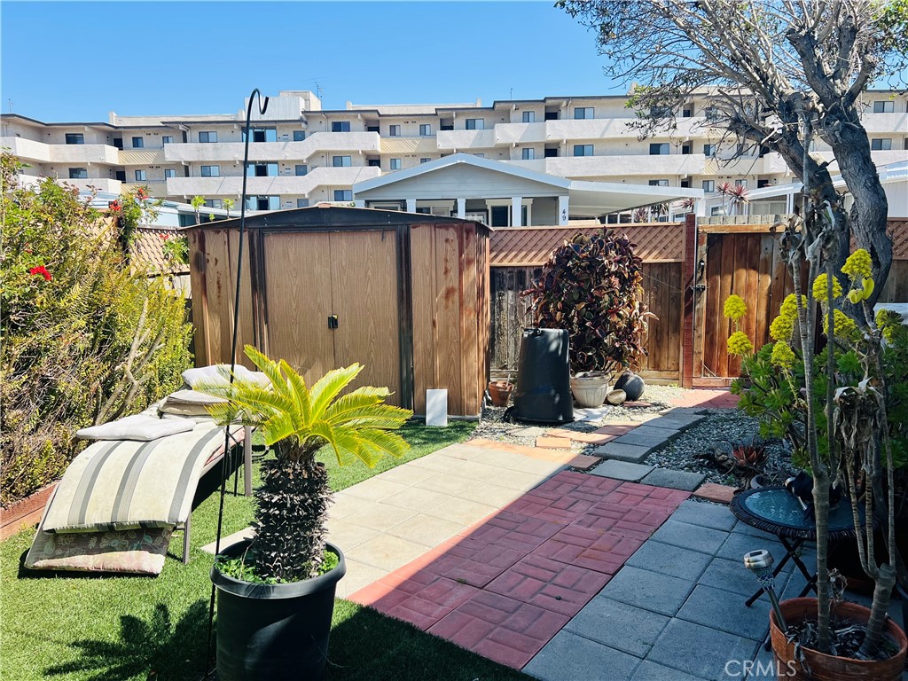 26200 Frampton Avenue, Unit 74 Harbor City, CA 90710 - Photo 7 of 19 a view of a chairs and table in patio