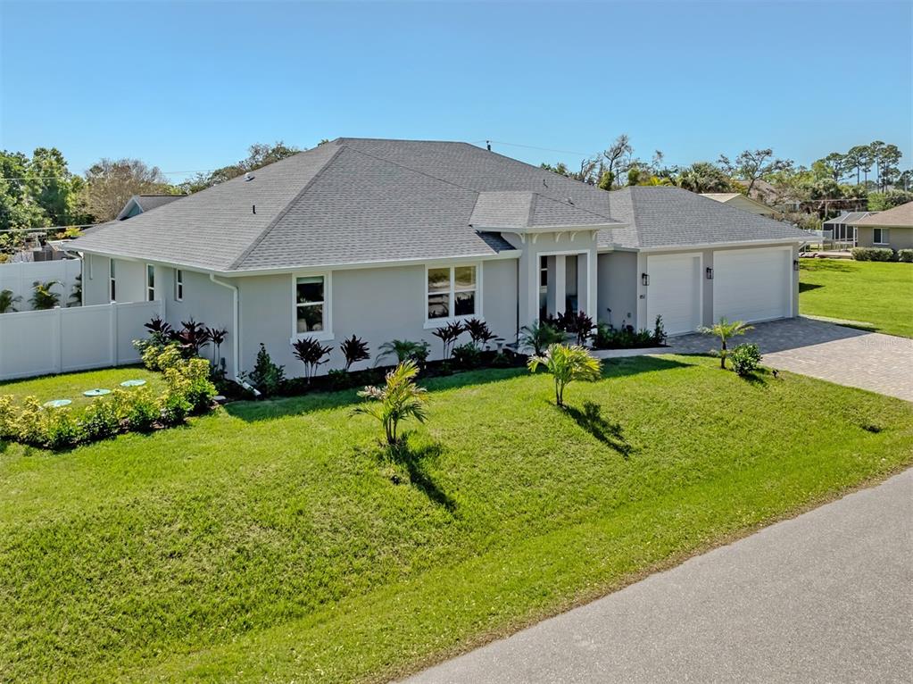 851 Linden Road Venice, FL 34293 - Photo 2 of 48 a view of a house with backyard porch and sitting area