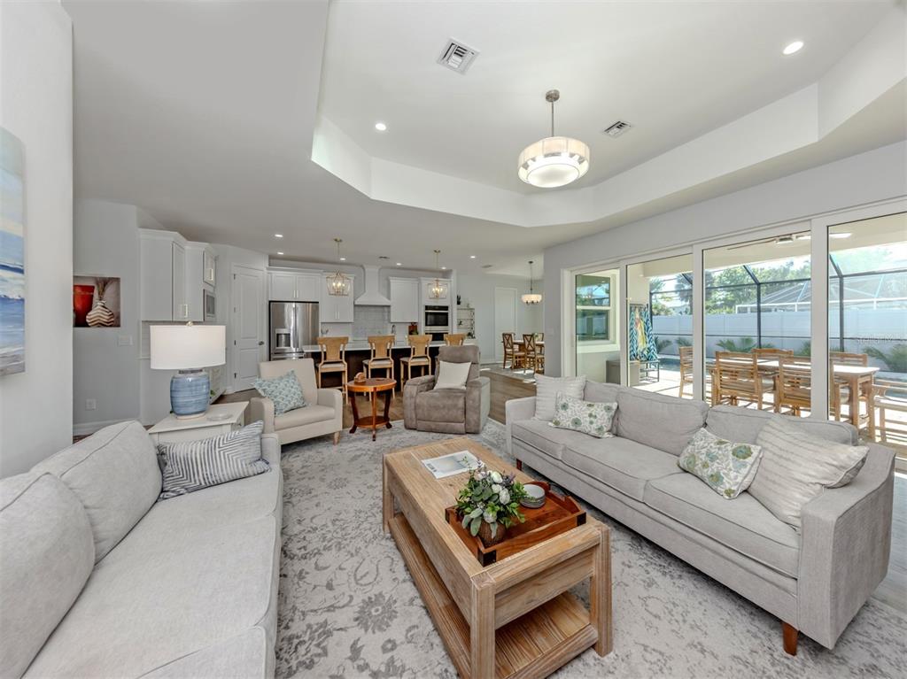 851 Linden Road Venice, FL 34293 - Photo 5 of 48 a living room with furniture and a large window