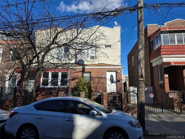 a car parked in front of a building
