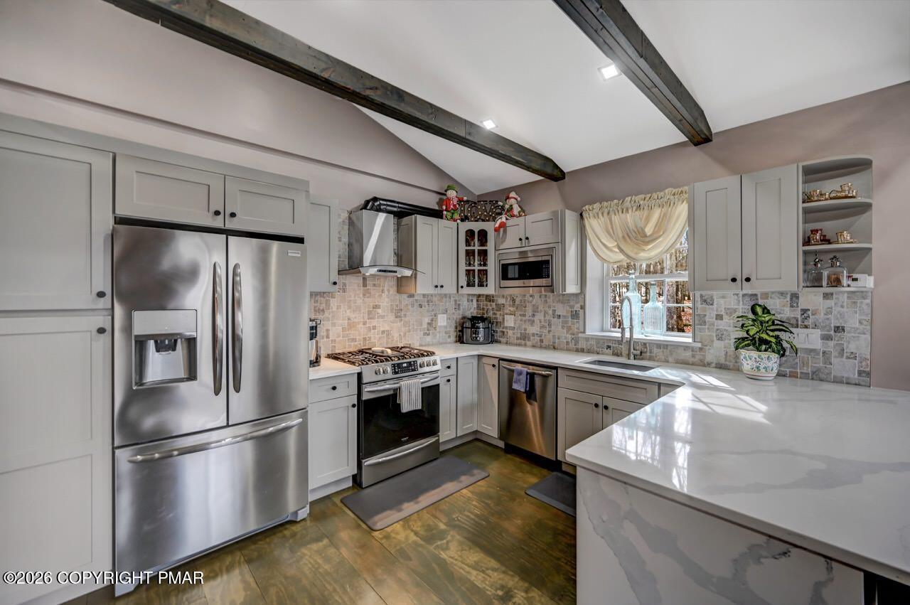 144 Highridge Road Albrightsville, PA 18210 - Photo 23 of 96 a kitchen with stainless steel appliances granite countertop a refrigerator a stove and a sink