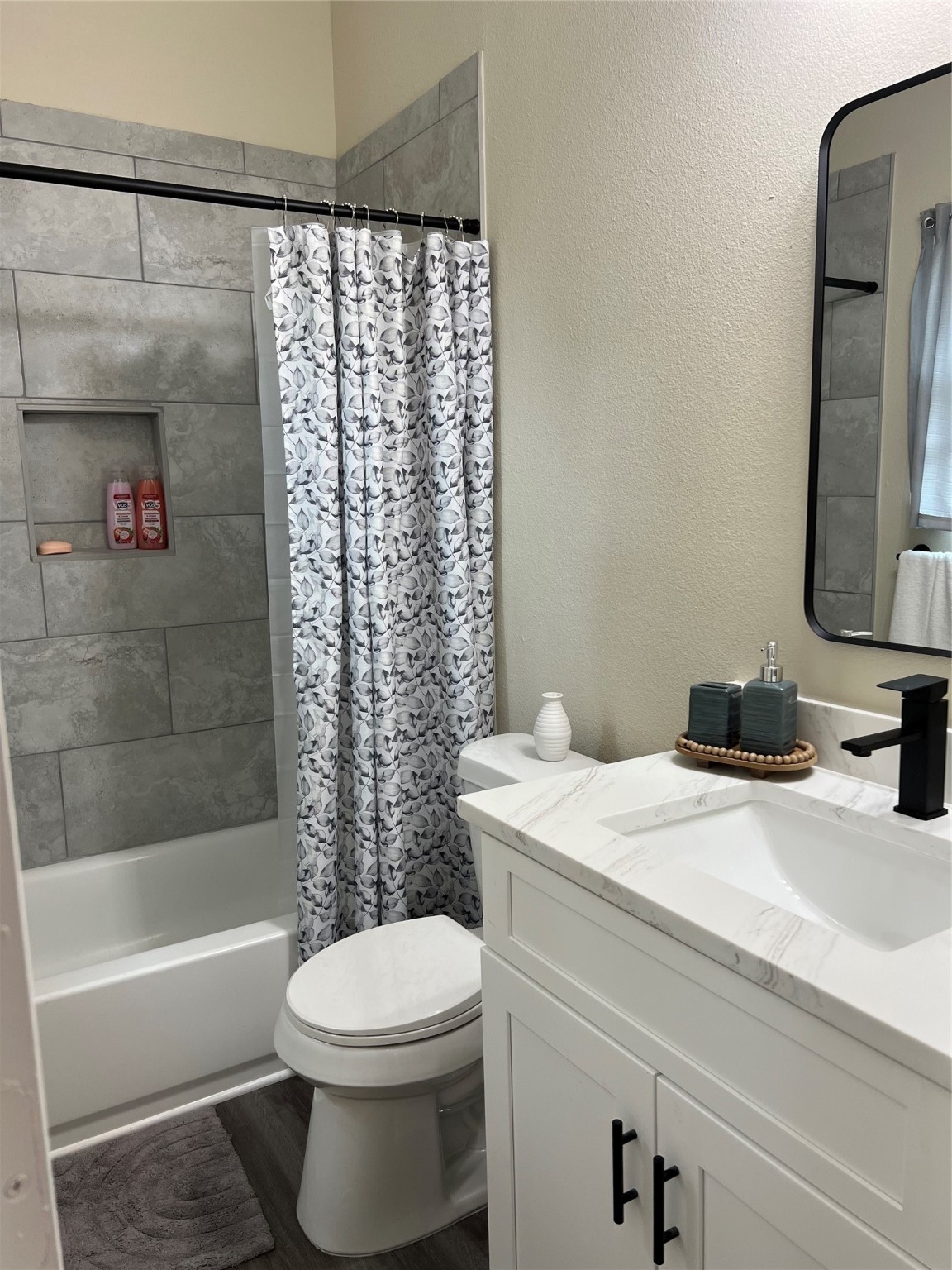 9441 Radio Road, Unit B Houston, TX 77075 - Photo 11 of 17 a bathroom with a sink a toilet and shower