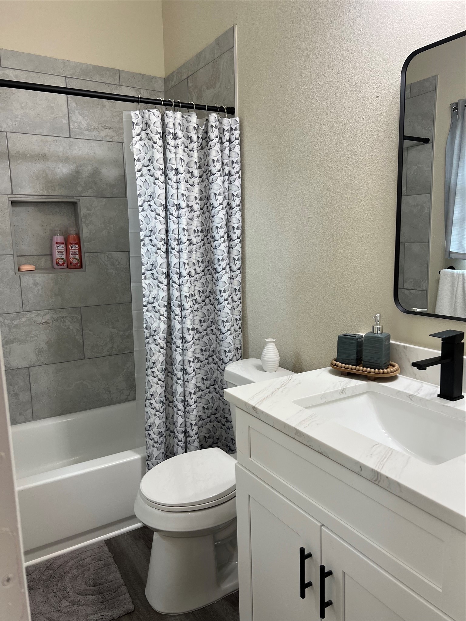 9441 Radio Road, Unit B Houston, TX 77075 - Photo 11 of 17 a bathroom with a sink a toilet and shower