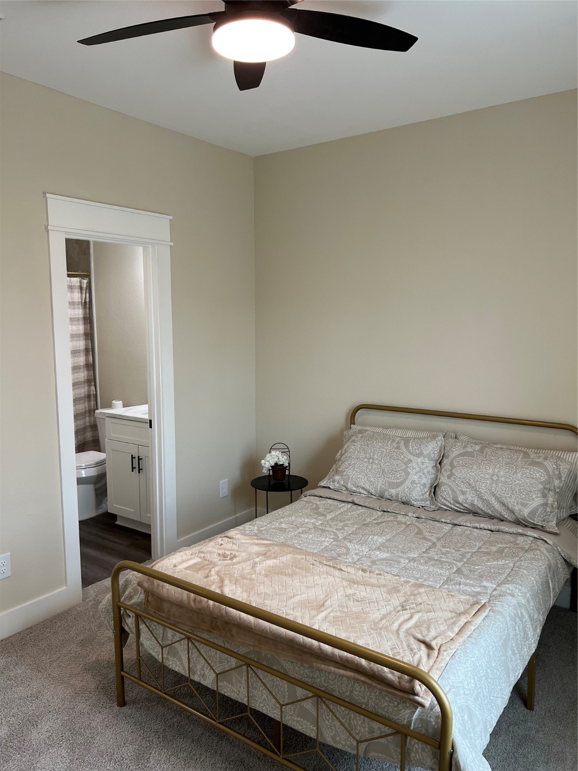 9441 Radio Road, Unit B Houston, TX 77075 - Photo 13 of 17 a bedroom with a bed and a view of bathroom