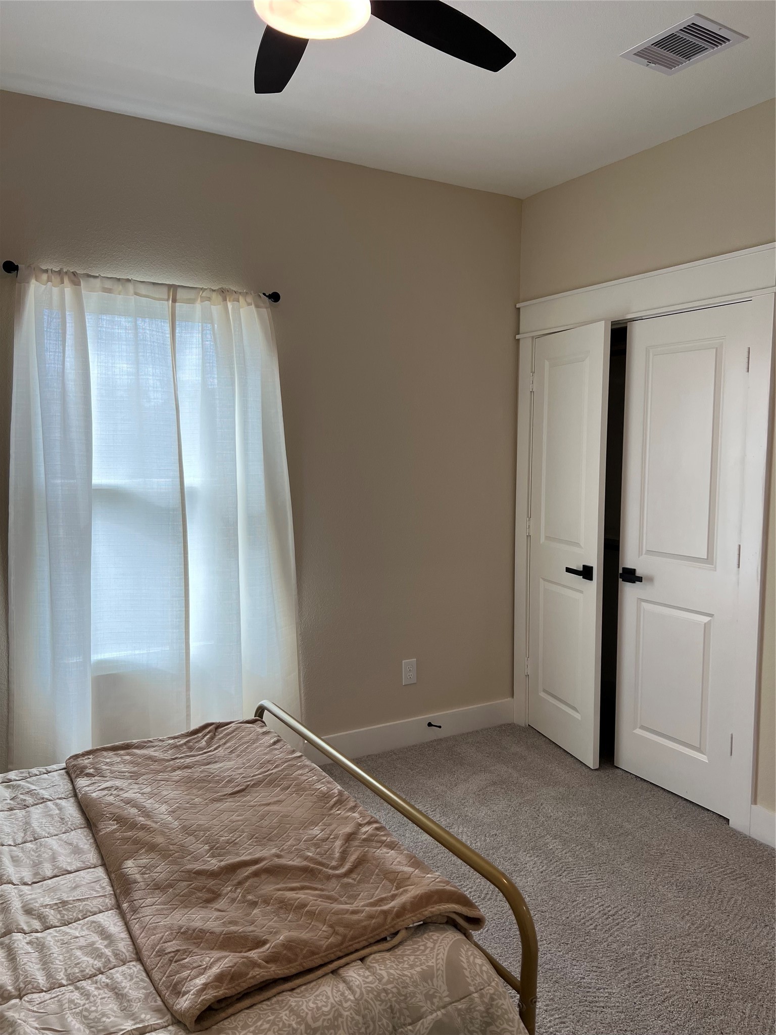 9441 Radio Road, Unit B Houston, TX 77075 - Photo 14 of 17 a bedroom with a bed and a window