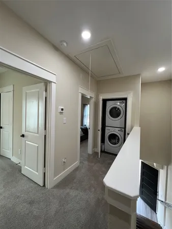 an entryway with a workspace