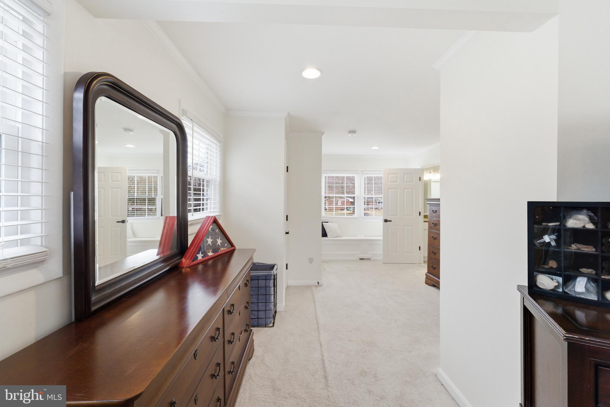 6124 Crozet Court Springfield, VA 22150 - Photo 24 of 57 a view of an entryway with wooden floor and a window