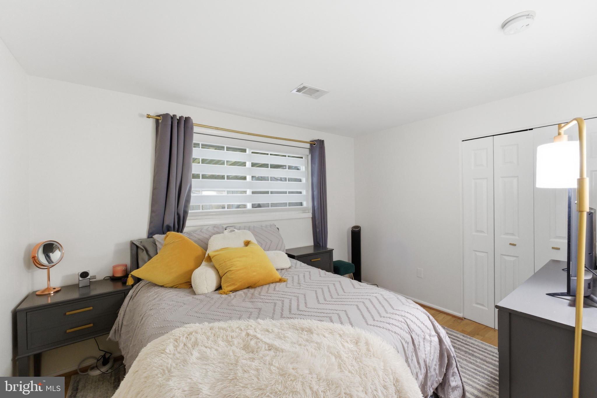 6124 Crozet Court Springfield, VA 22150 - Photo 41 of 57 a bedroom with a bed and a window