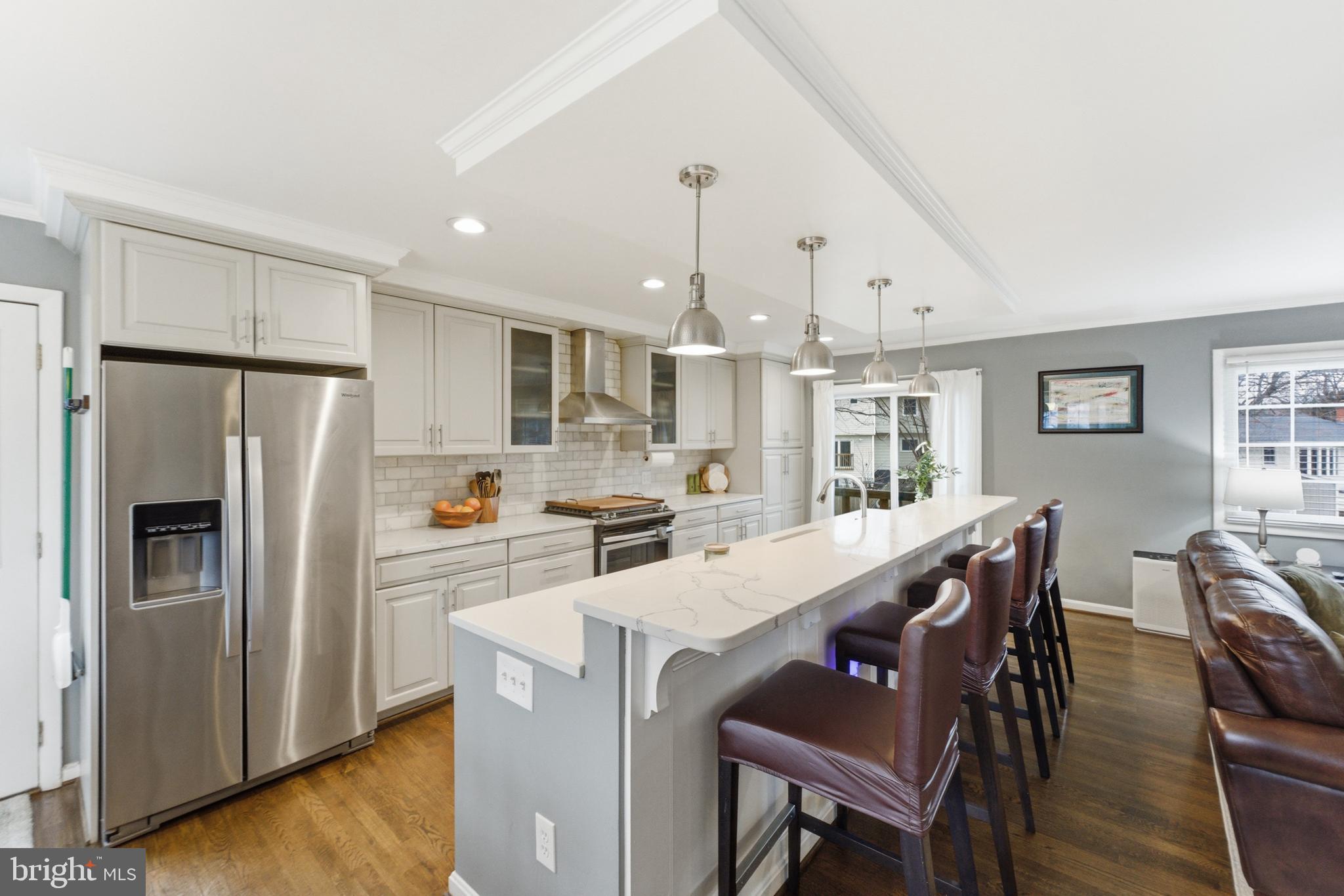 6124 Crozet Court Springfield, VA 22150 - Photo 7 of 57 a view of kitchen with furniture and wooden floor
