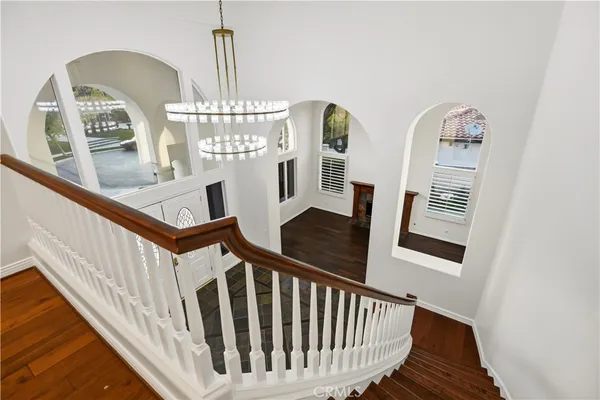 a view of entryway with wooden floor
