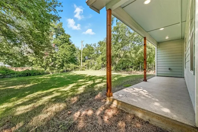 a view of a yard with porch
