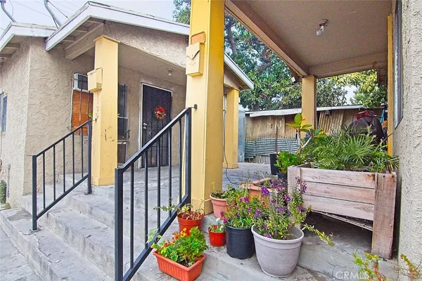 a view of a potted plants on a balcony