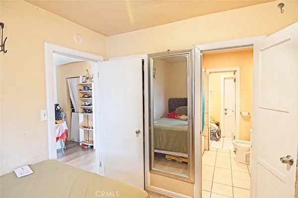 a view of a bathroom with mirror