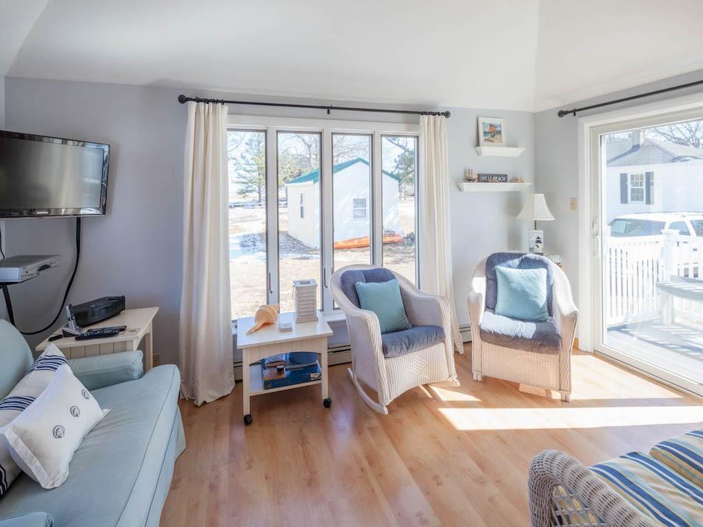 106 Hills Beach Road Biddeford, ME 04005 - Photo 9 of 18 The living room with deck off to the...