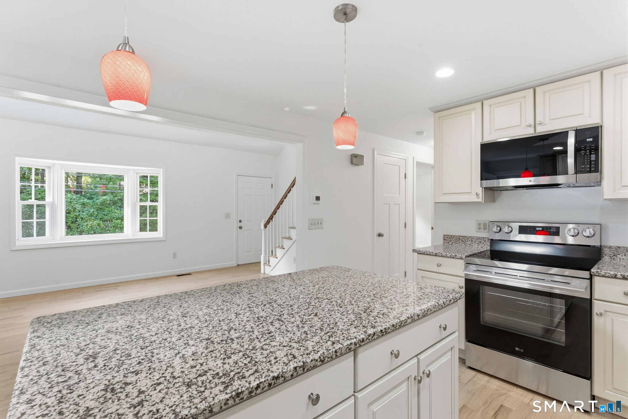210 Springbrook Road Old Saybrook, CT 06475 - Photo 11 of 32 Kitchen - looking out toward the living room and hallway.