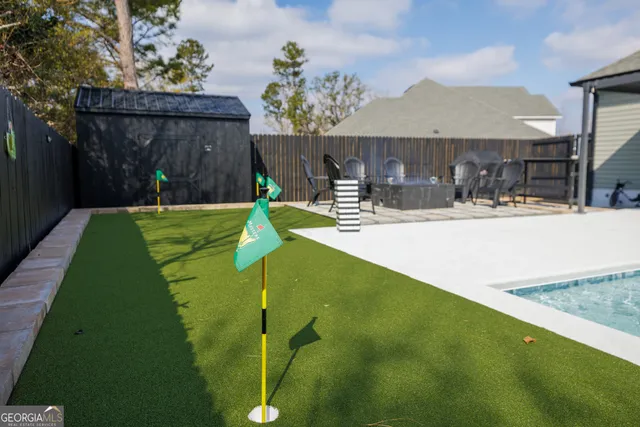 a backyard of a house with trees