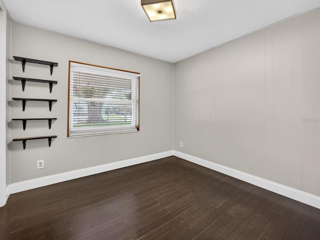 333 Cornwall Road Winter Park, FL 32792 - Photo 21 of 32 a view of a room with wooden floor and windows