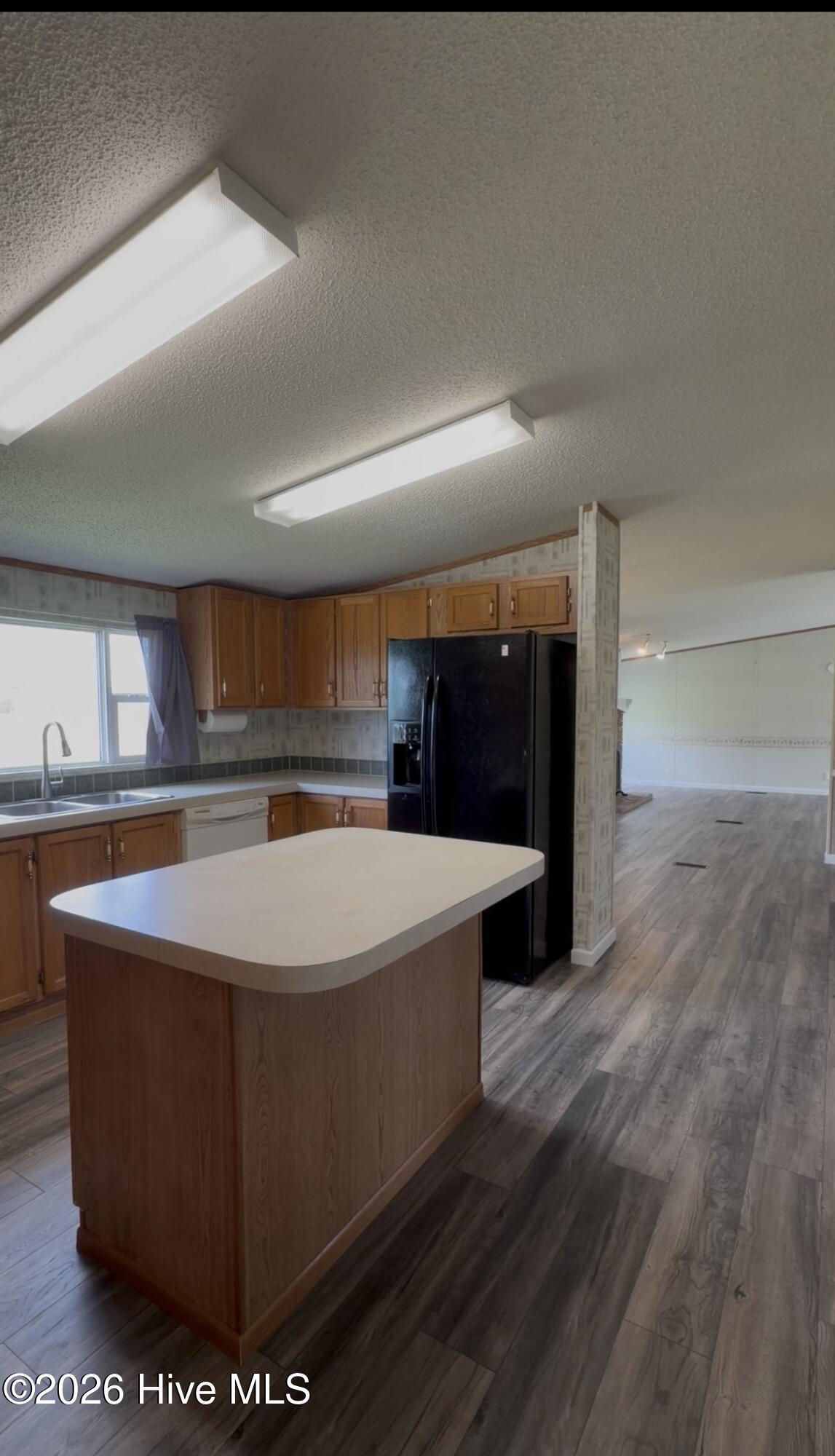 193 Mill Road Hertford, NC 27944 - Photo 5 of 34 Hall leaving kitchen