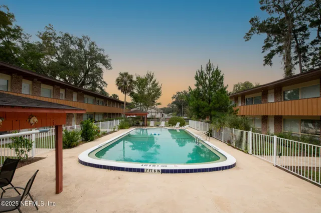 a view of a house with a swimming pool
