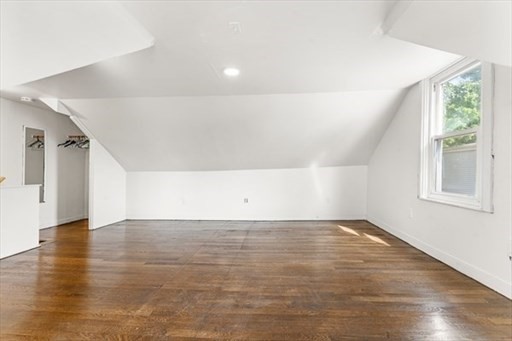 29-31 Pond Street Canton, MA 02021 - Photo 10 of 12 a view of an empty room with wooden floor and a window