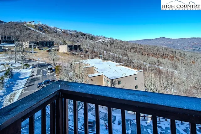 a view of a balcony with an outdoor space