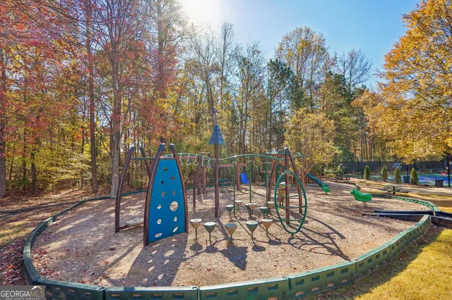 a view of a park with large trees