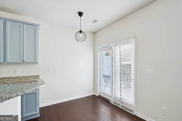 an empty room with a hallway