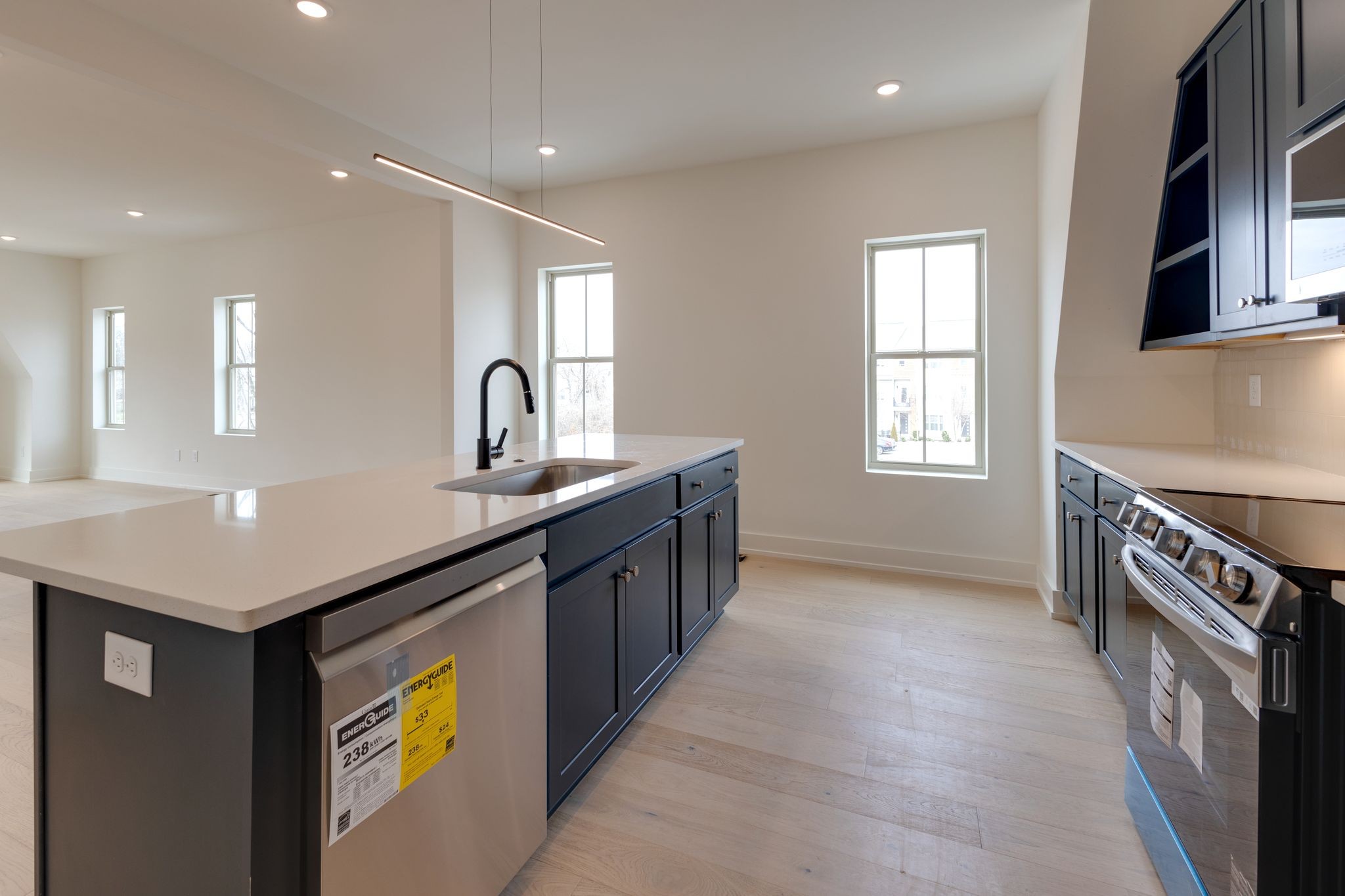 531 Midnight Way Nashville, TN 37209 - Photo 12 of 44 a kitchen with kitchen island granite countertop a sink counter top space and cabinets